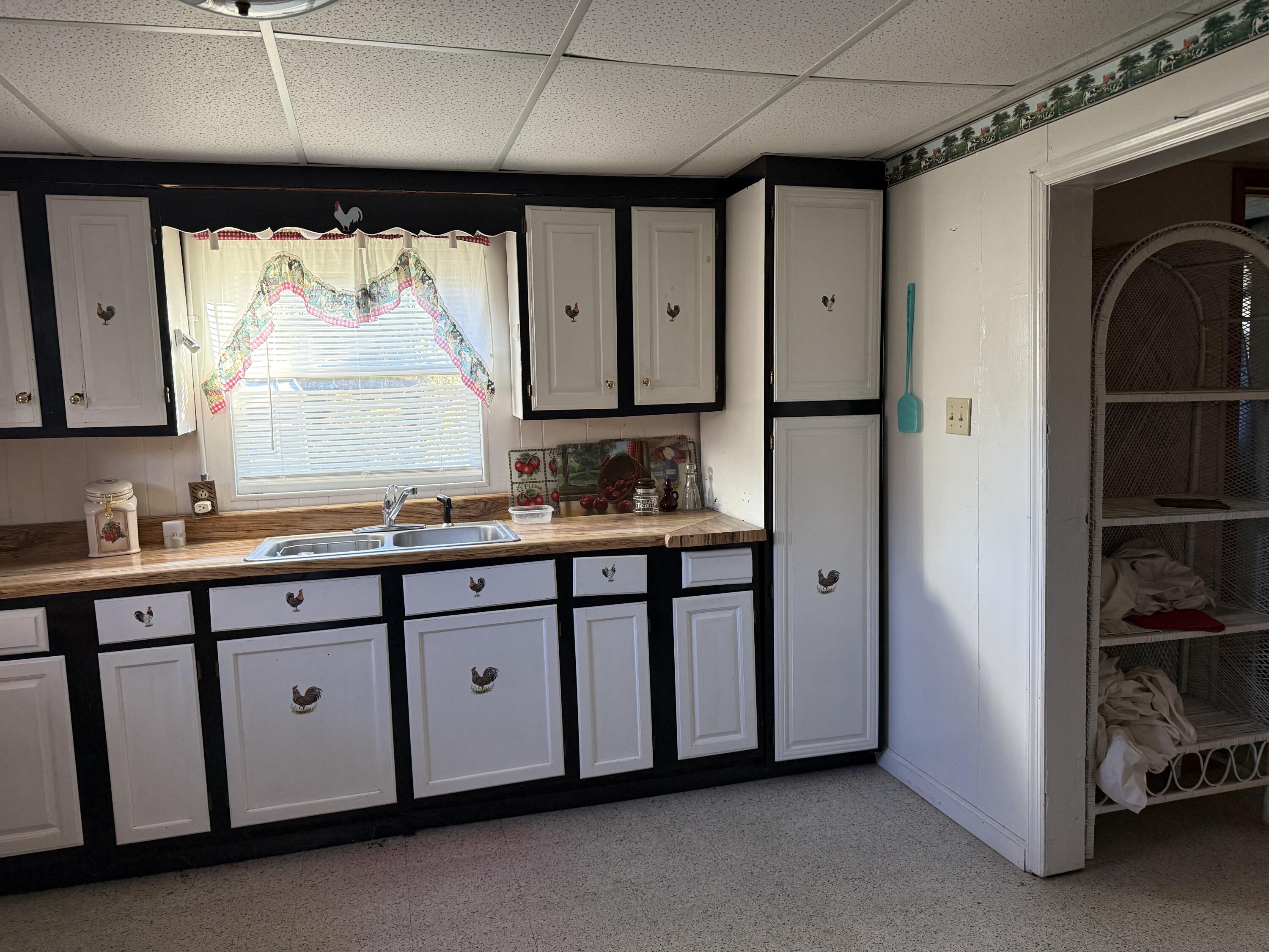 1028 Roswell Lane Blue Ridge, VA 24064 - Photo 12 of 21 a bathroom with a double vanity sink a mirror and a bathtub