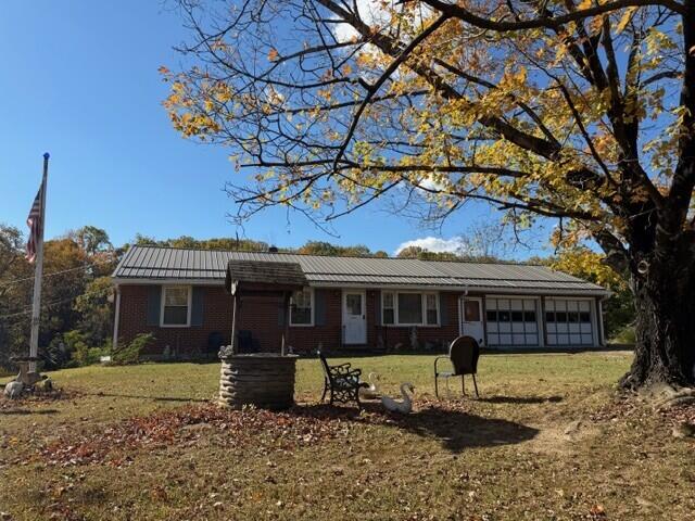 1028 Roswell Lane Blue Ridge, VA 24064 - Photo 16 of 21 a front view of a house with a yard