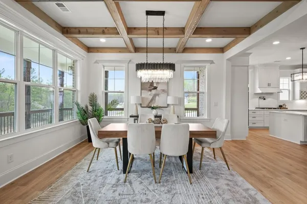 a living room with furniture fireplace and flat screen tv