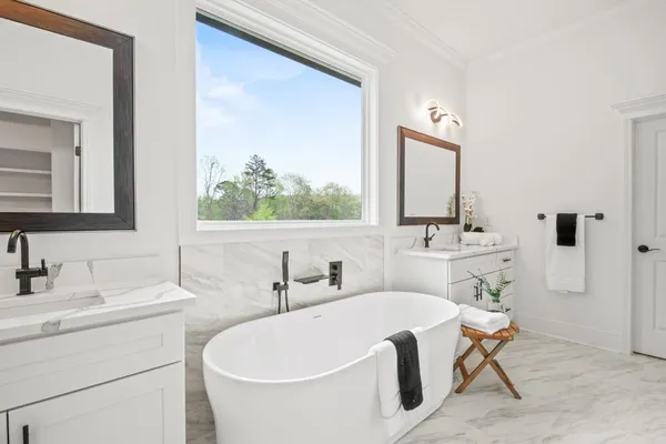 a bathroom with a sink a toilet and a bathtub
