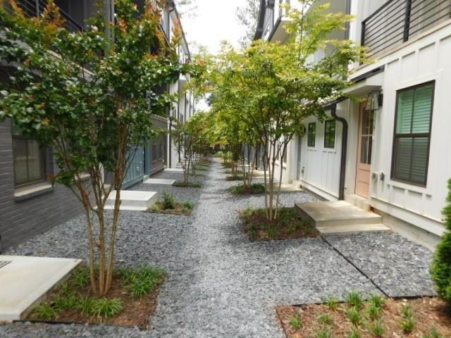 139 Pacer Place Atlanta, GA 30342 - Photo 1 of 31 a backyard of a house with lots of green space
