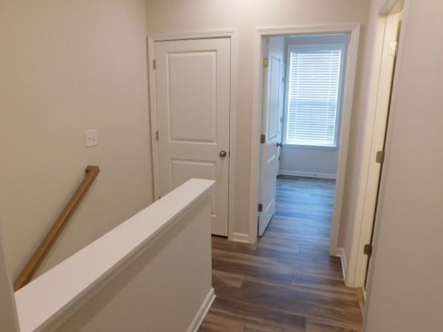 139 Pacer Place Atlanta, GA 30342 - Photo 20 of 31 a view of a hallway with wooden floor