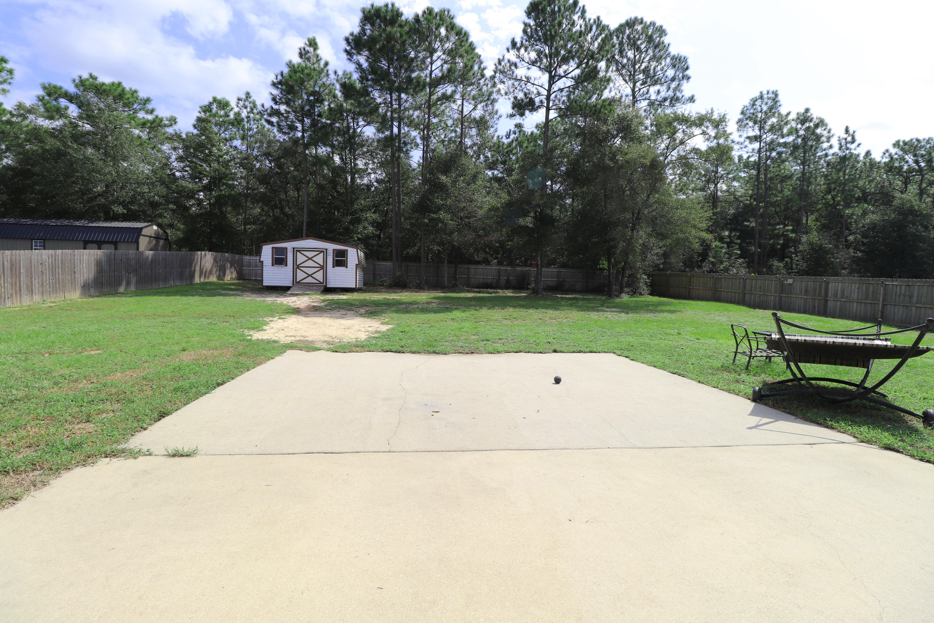 6181 Hummingbird Lane Crestview, FL 32536 - Photo 38 of 56 a view of a park with large trees