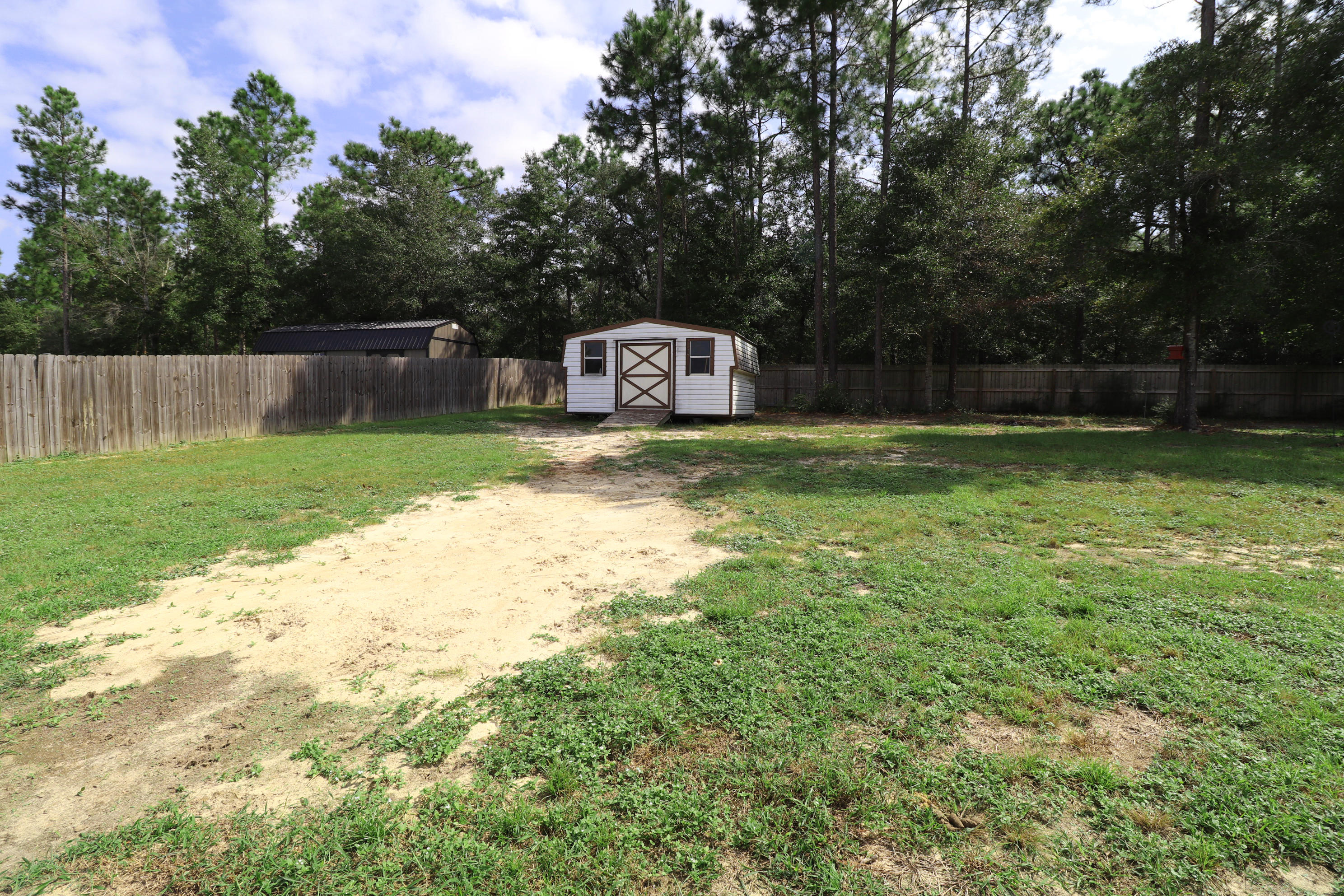 6181 Hummingbird Lane Crestview, FL 32536 - Photo 39 of 56 a view of a back yard