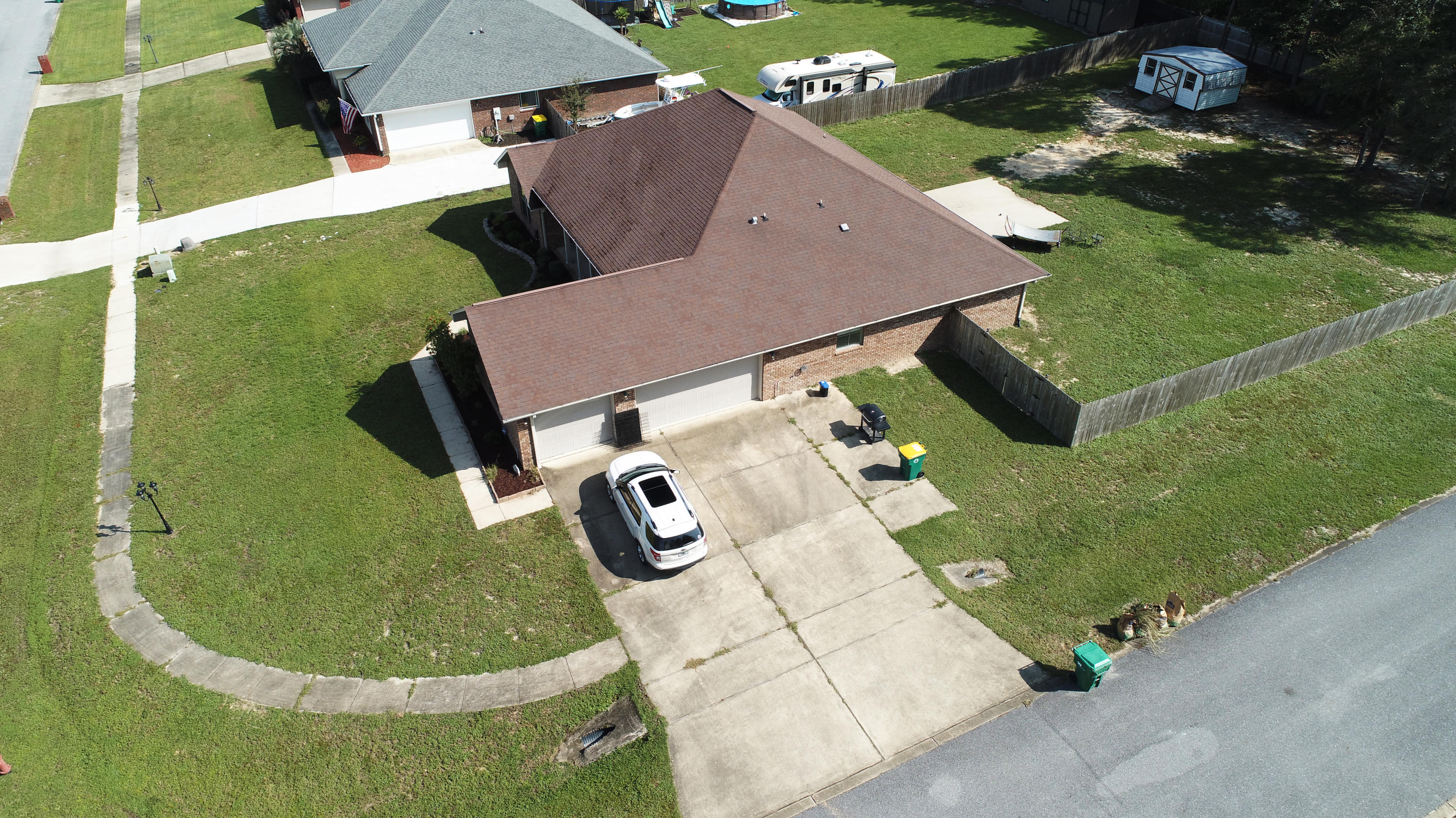 6181 Hummingbird Lane Crestview, FL 32536 - Photo 42 of 56 an aerial view of a house with outdoor space and a garden