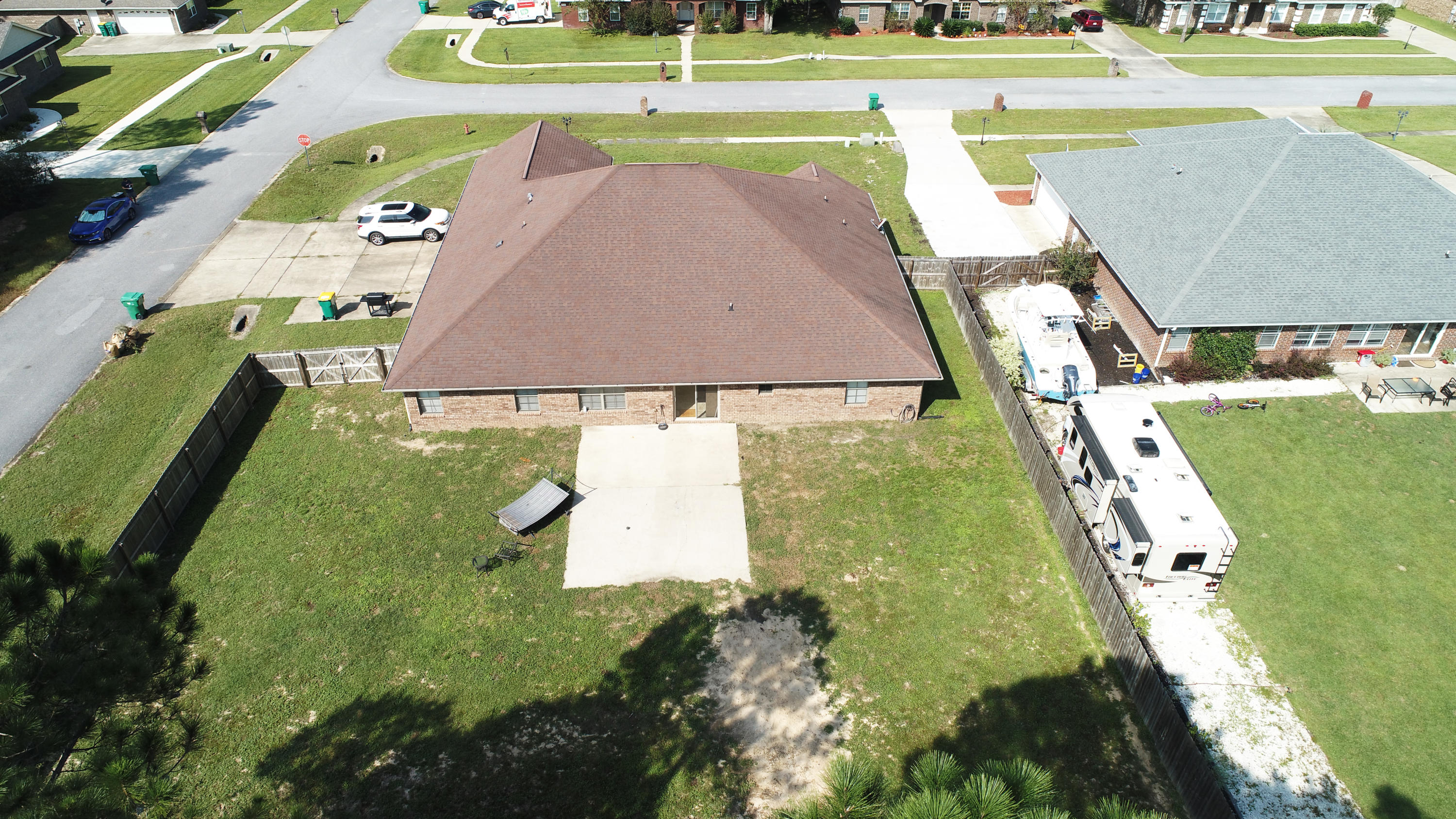 6181 Hummingbird Lane Crestview, FL 32536 - Photo 45 of 56 a view of a swimming pool with a yard