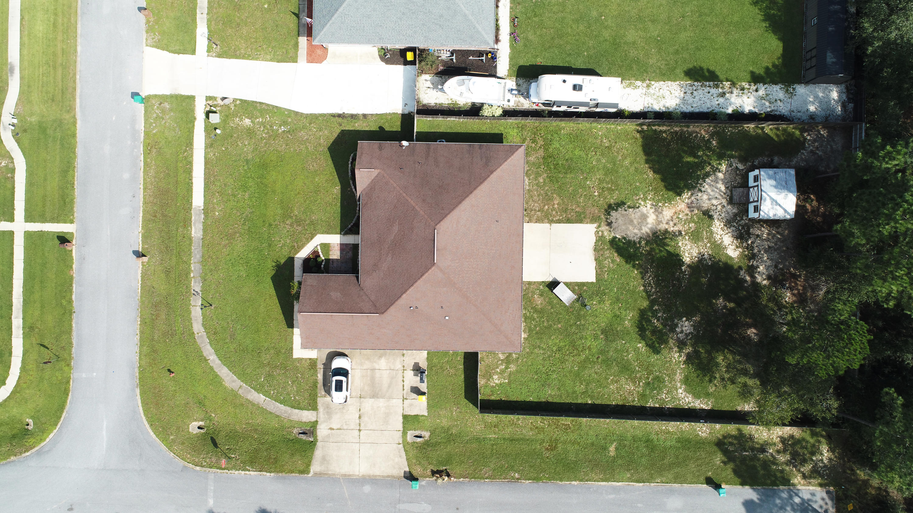 6181 Hummingbird Lane Crestview, FL 32536 - Photo 49 of 56 an aerial view of a house with a lake view