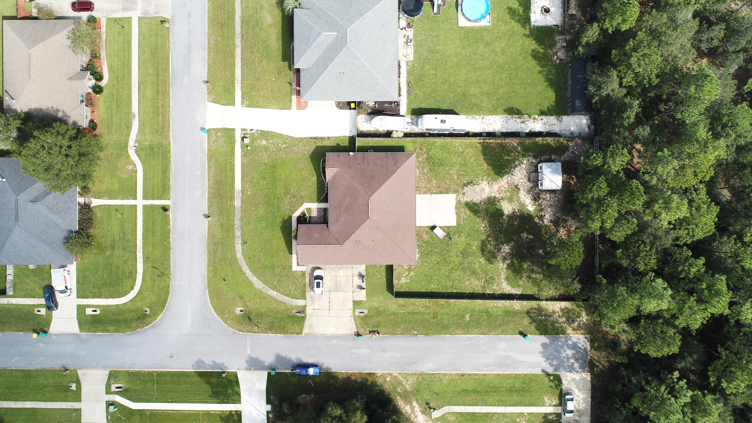 6181 Hummingbird Lane Crestview, FL 32536 - Photo 51 of 56 an aerial view of houses with outdoor space