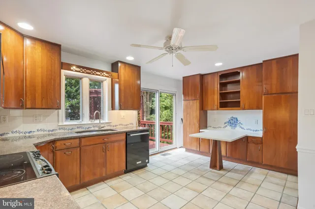 a bathroom with a sink a mirror and a shower