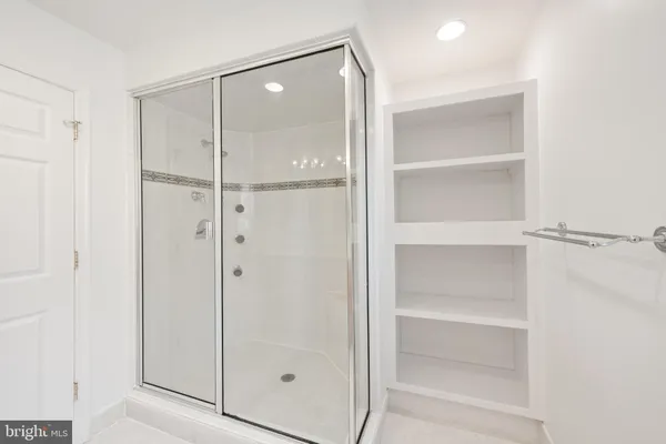 an empty room with a fireplace