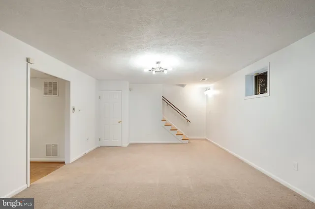 a bathroom with a sink toilet and vanity