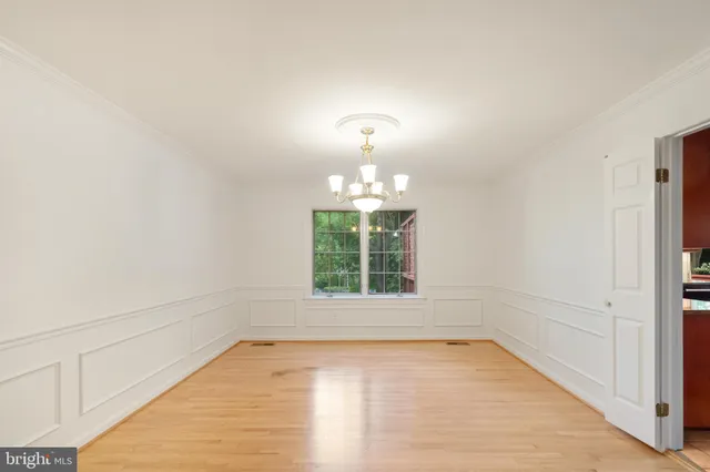 a view of a livingroom with wooden floor