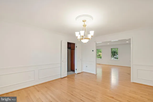 a kitchen with a sink cabinets and window