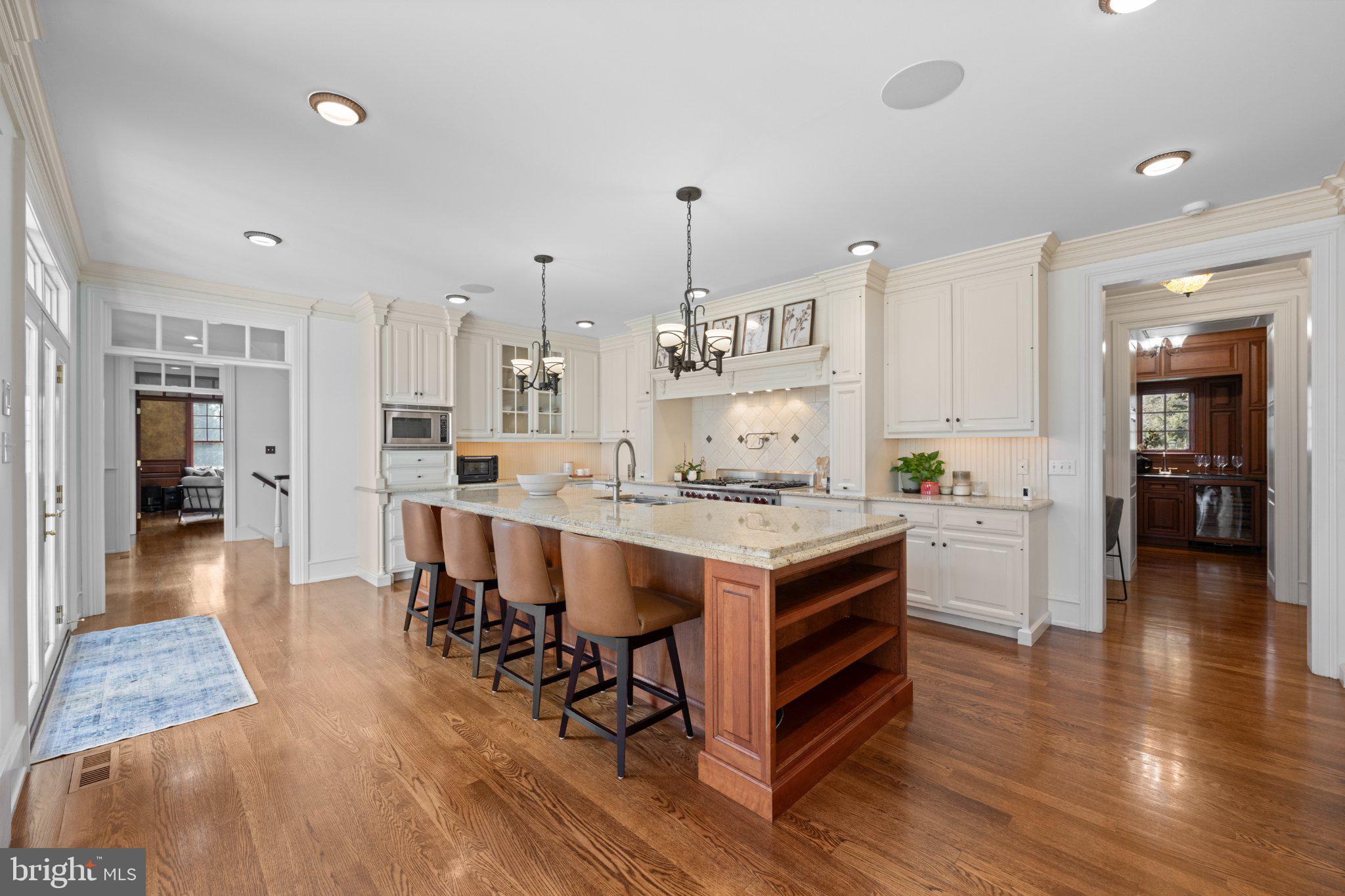 429 Church Road Devon, PA 19333 - Photo 14 of 55 Elegant kitchen with warm wood tones.