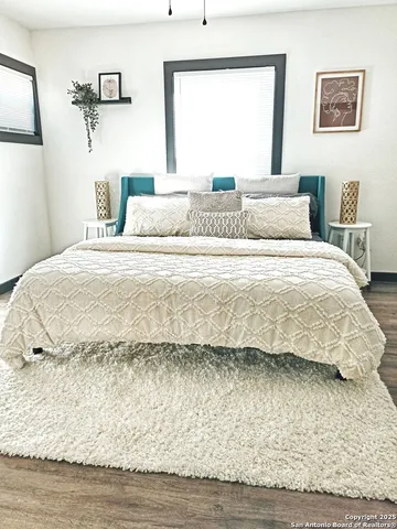 a bathroom with a sink a mirror and a vanity