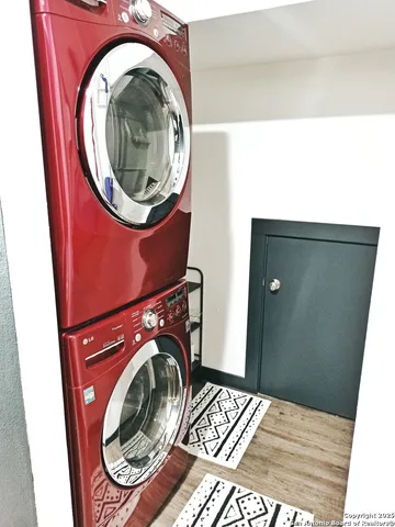 a view of a two chairs in a backyard