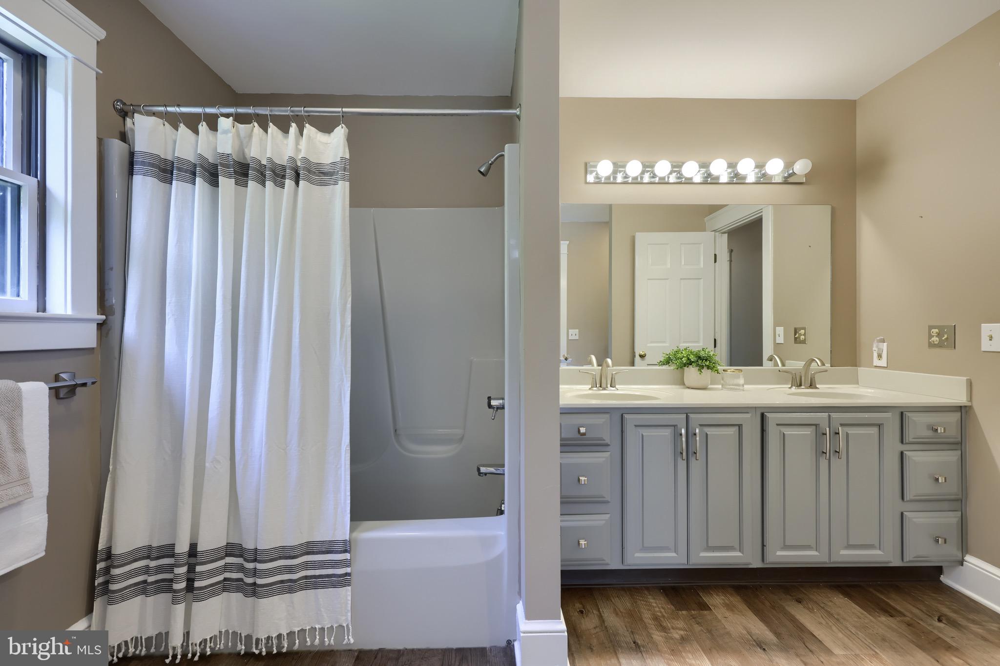 575 Church Road Manheim, PA 17545 - Photo 50 of 96 a bathroom with a double vanity sink and a mirror