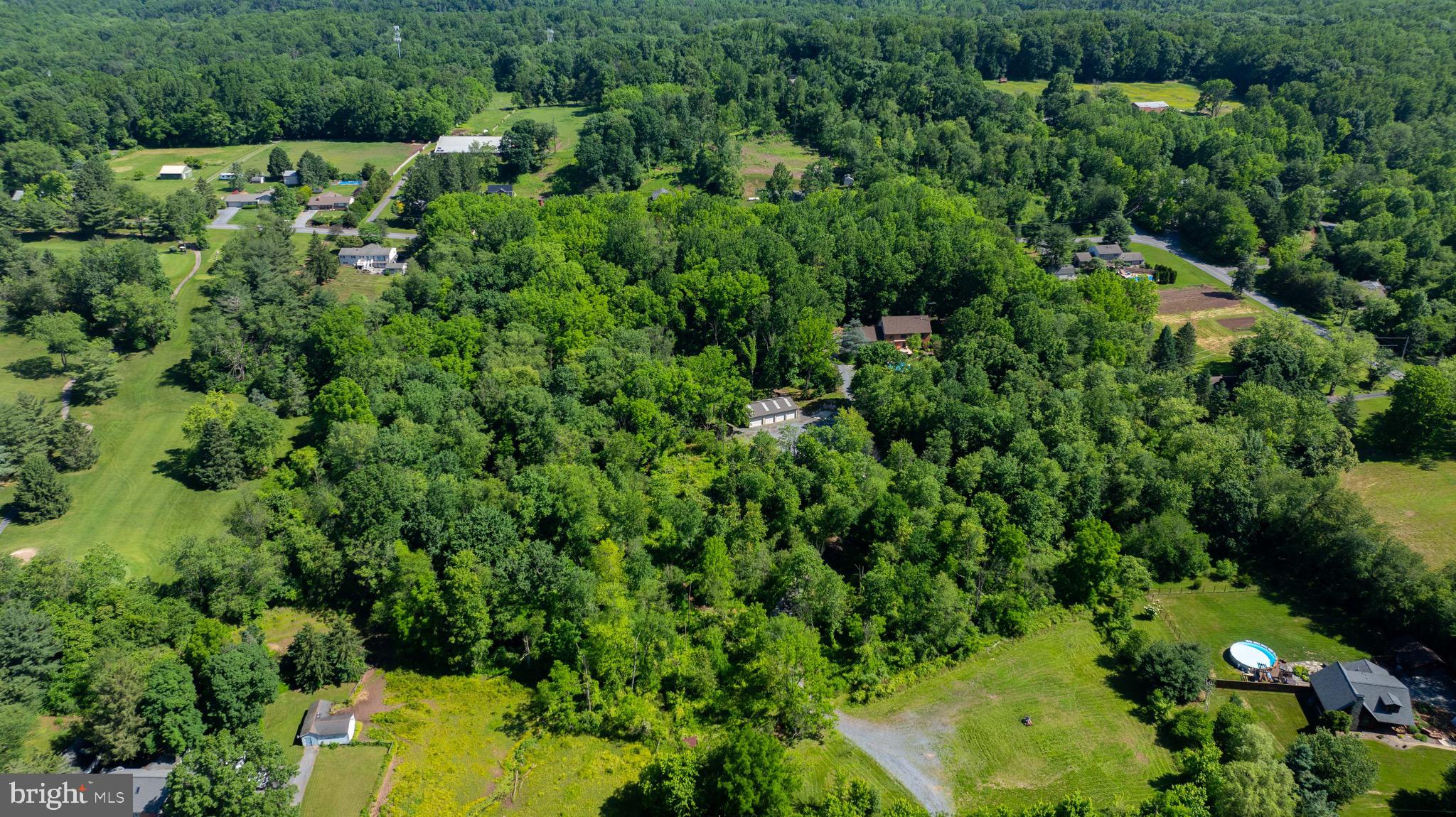 575 Church Road Manheim, PA 17545 - Photo 85 of 96 an aerial view of residential house with outdoor space and trees all around
