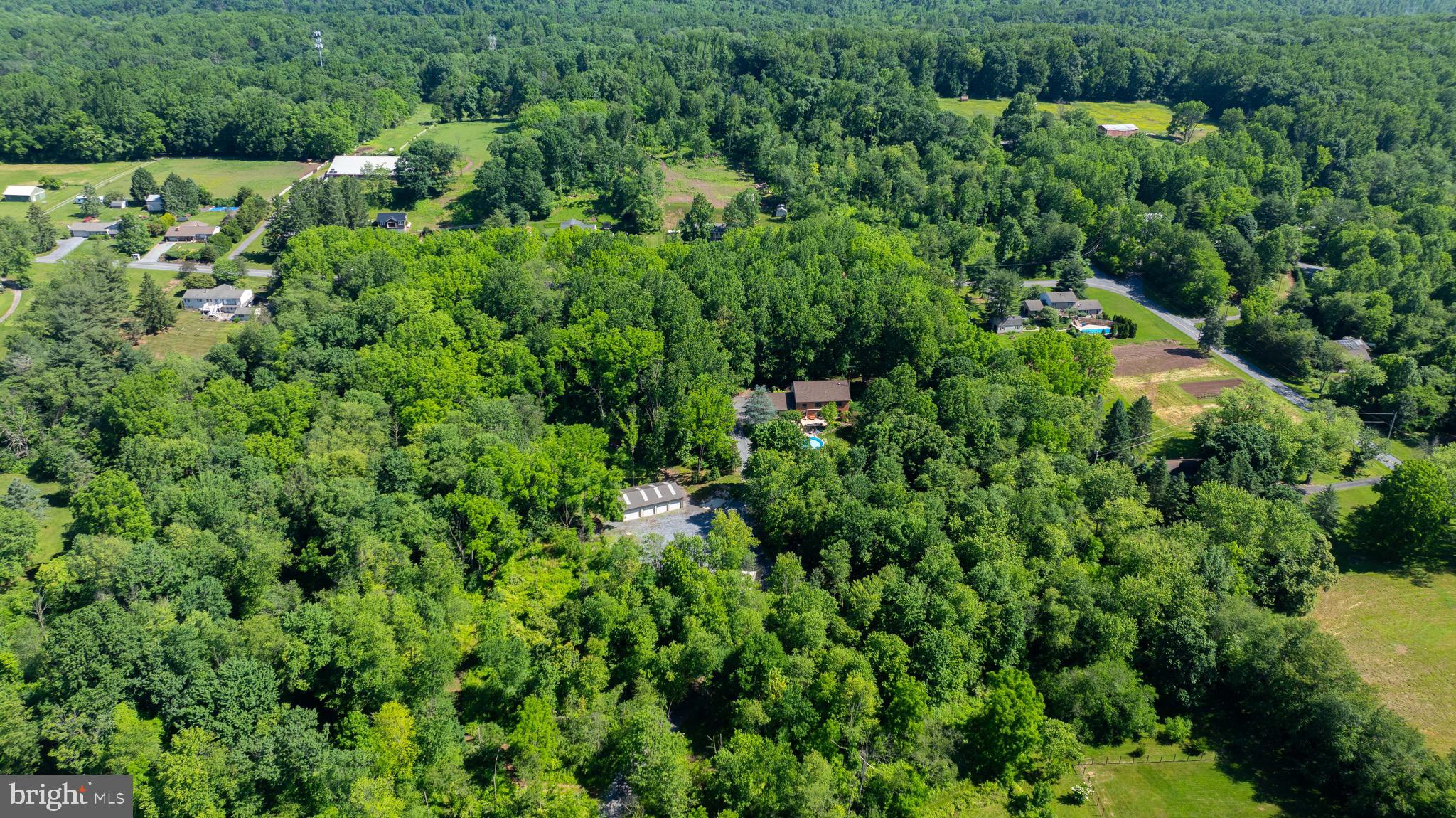 575 Church Road Manheim, PA 17545 - Photo 86 of 96 an aerial view of residential house with outdoor space and trees all around