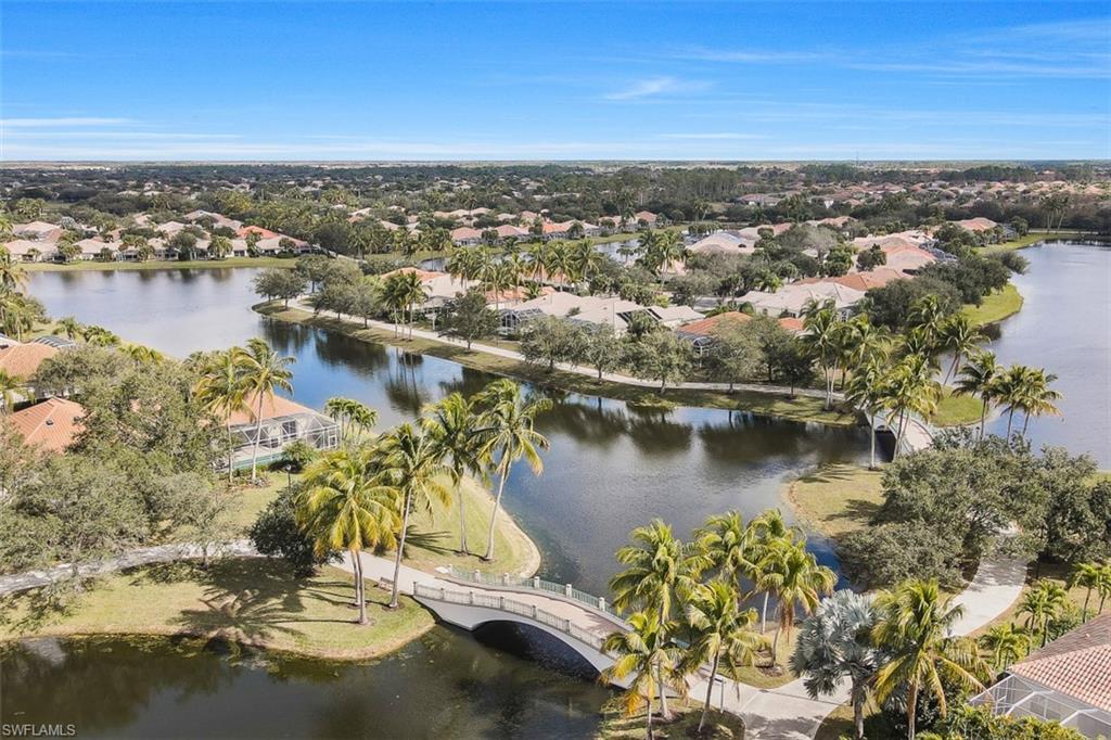 4080 Trinidad Way Naples, FL 34119 - Photo 24 of 35 an aerial view of residential houses with outdoor space