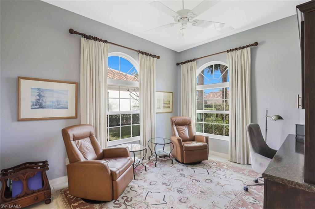 4080 Trinidad Way Naples, FL 34119 - Photo 3 of 35 a living room with furniture and a window