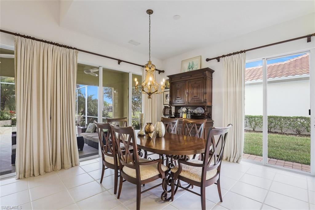 4080 Trinidad Way Naples, FL 34119 - Photo 8 of 35 a view of a dining room with furniture window and outside view