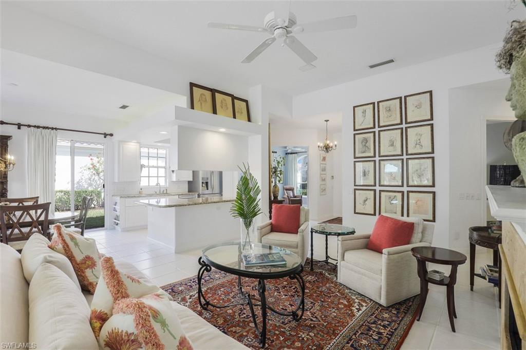 4080 Trinidad Way Naples, FL 34119 - Photo 10 of 35 a living room with furniture and a large window