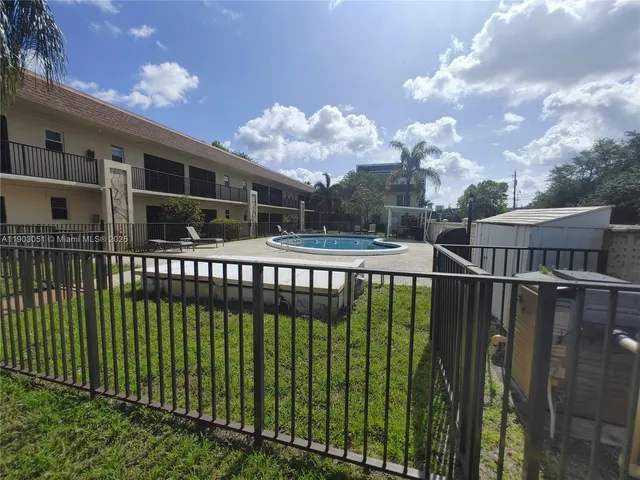 a view of house with yard and entertaining space