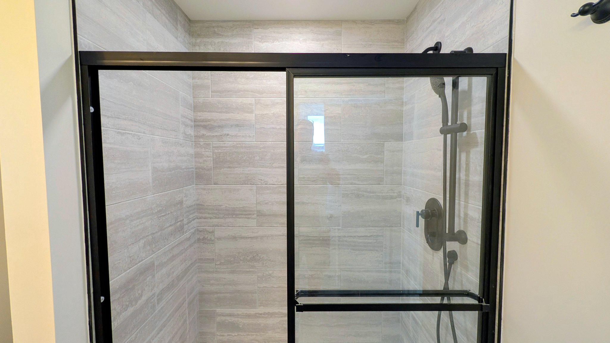 425 Rutledge Avenue Folsom, PA 19033 - Photo 25 of 33 Oversized shower w/ tile surround & glass doors.