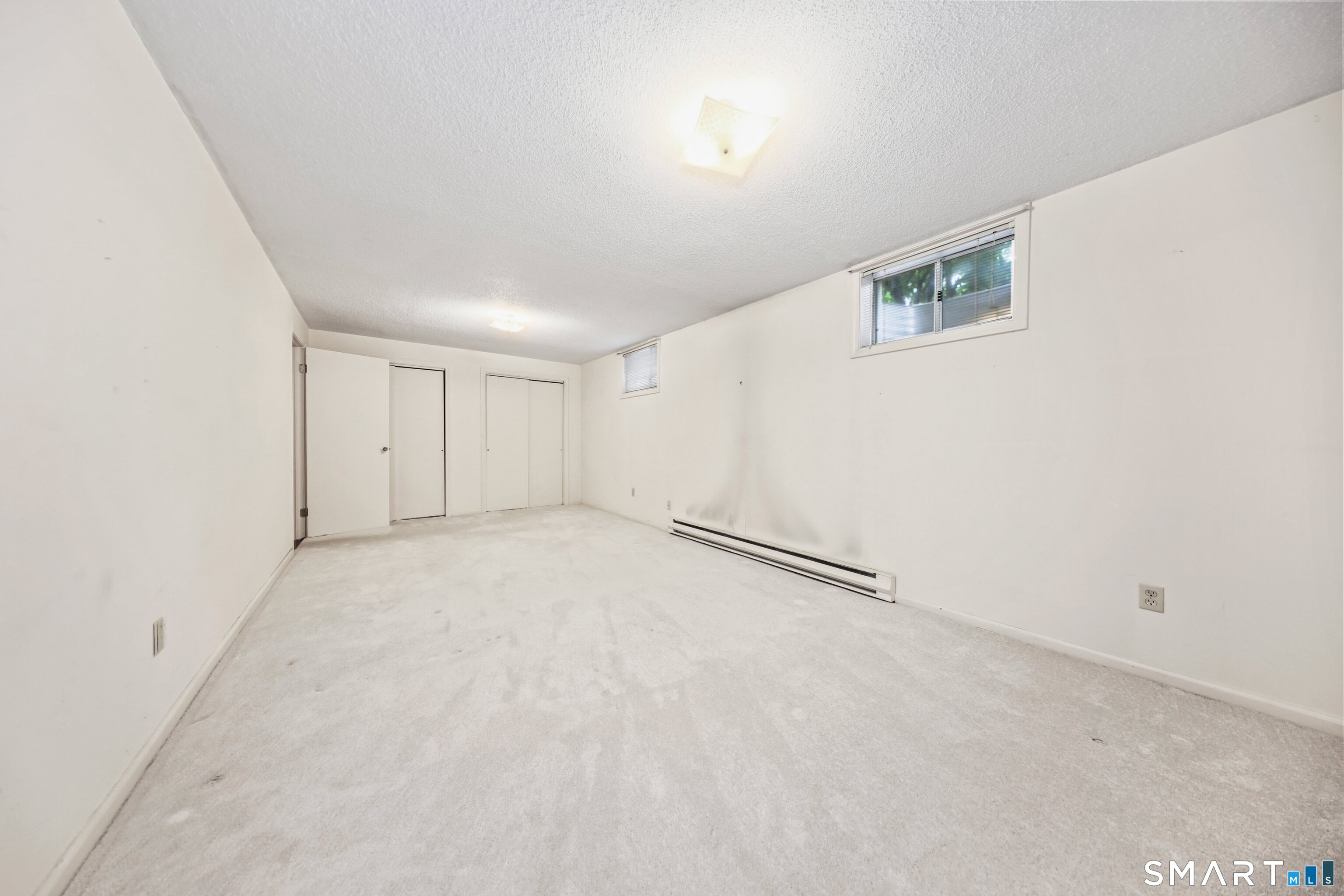 123 Queens Road, Unit 123 Torrington, CT 06790 - Photo 23 of 34 Finished lower level