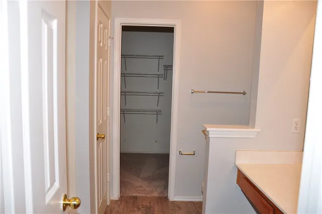 a bathroom with a tub and shower