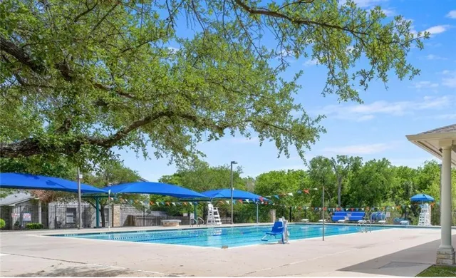 a view of a park that has a tree in it