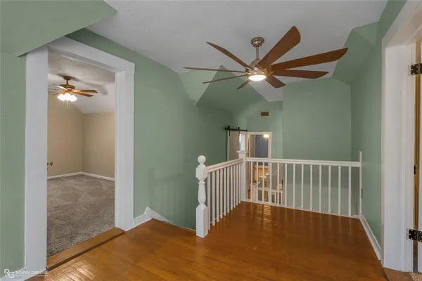 a view of a livingroom with a hardwood floor