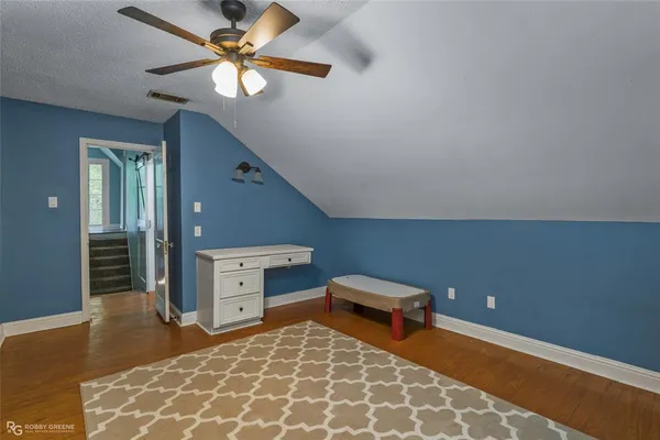 a room with furniture and a chandelier