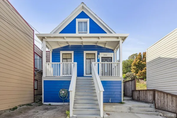 a front view of a house with a porch