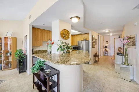 a view of a living room and dining room
