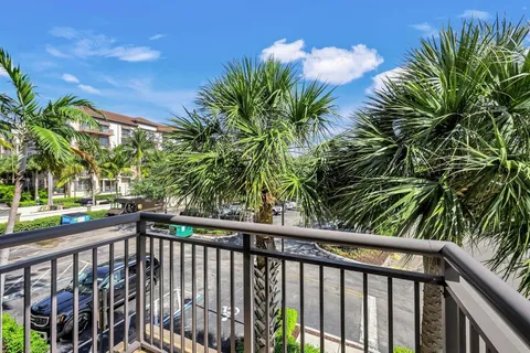 a view of street from a balcony