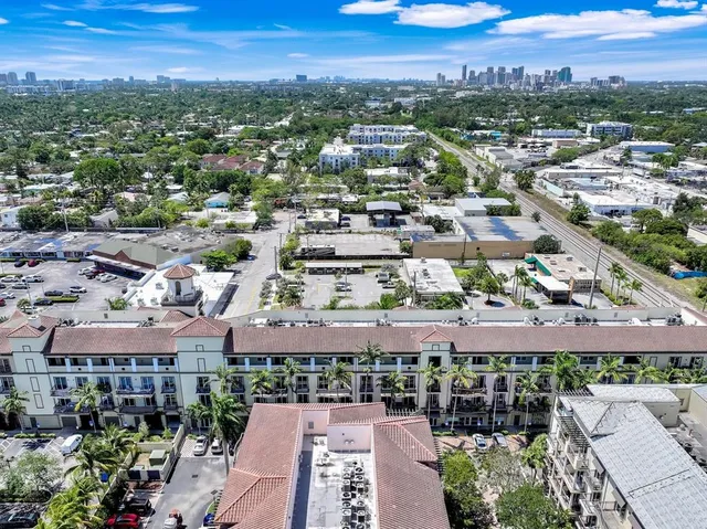 a view of city with tall buildings