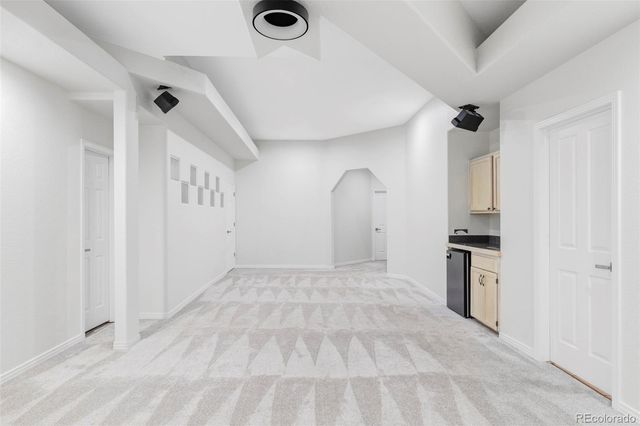 a view of a kitchen with a sink
