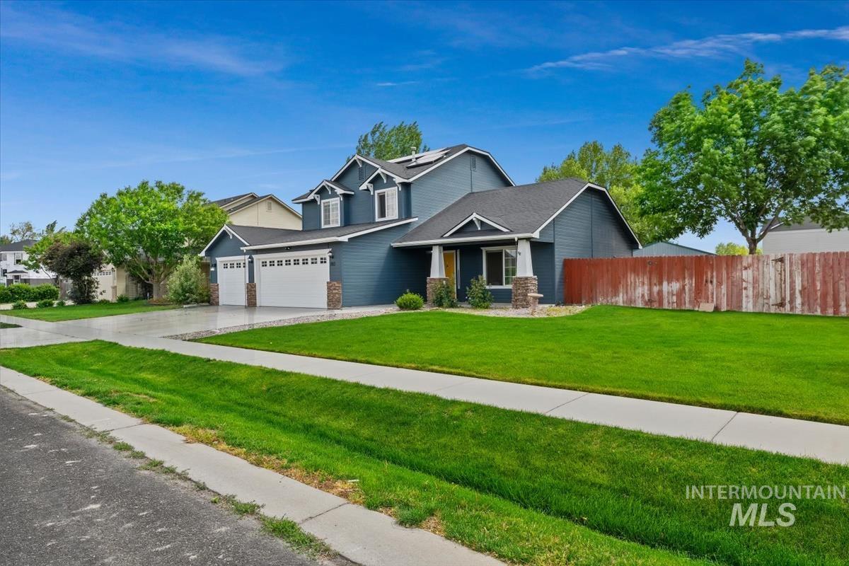 80 Cobblestone Court Middleton, ID 83644 - Photo 47 of 48 Two-story residence featuring deep blue siding and white trim