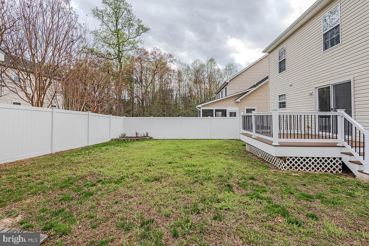 647 210th Street Pasadena, MD 21122 - Photo 38 of 44 a view of a house with a yard