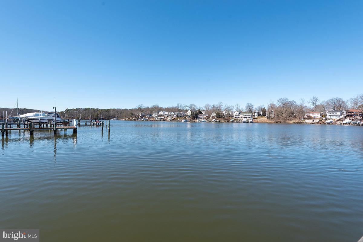 647 210th Street Pasadena, MD 21122 - Photo 44 of 44 a view of a lake with outdoor space