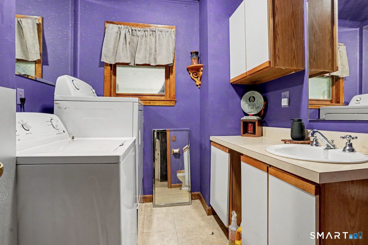 74 Maple Street Seymour, CT 06483 - Photo 18 of 40 a utility room with dryer and washer