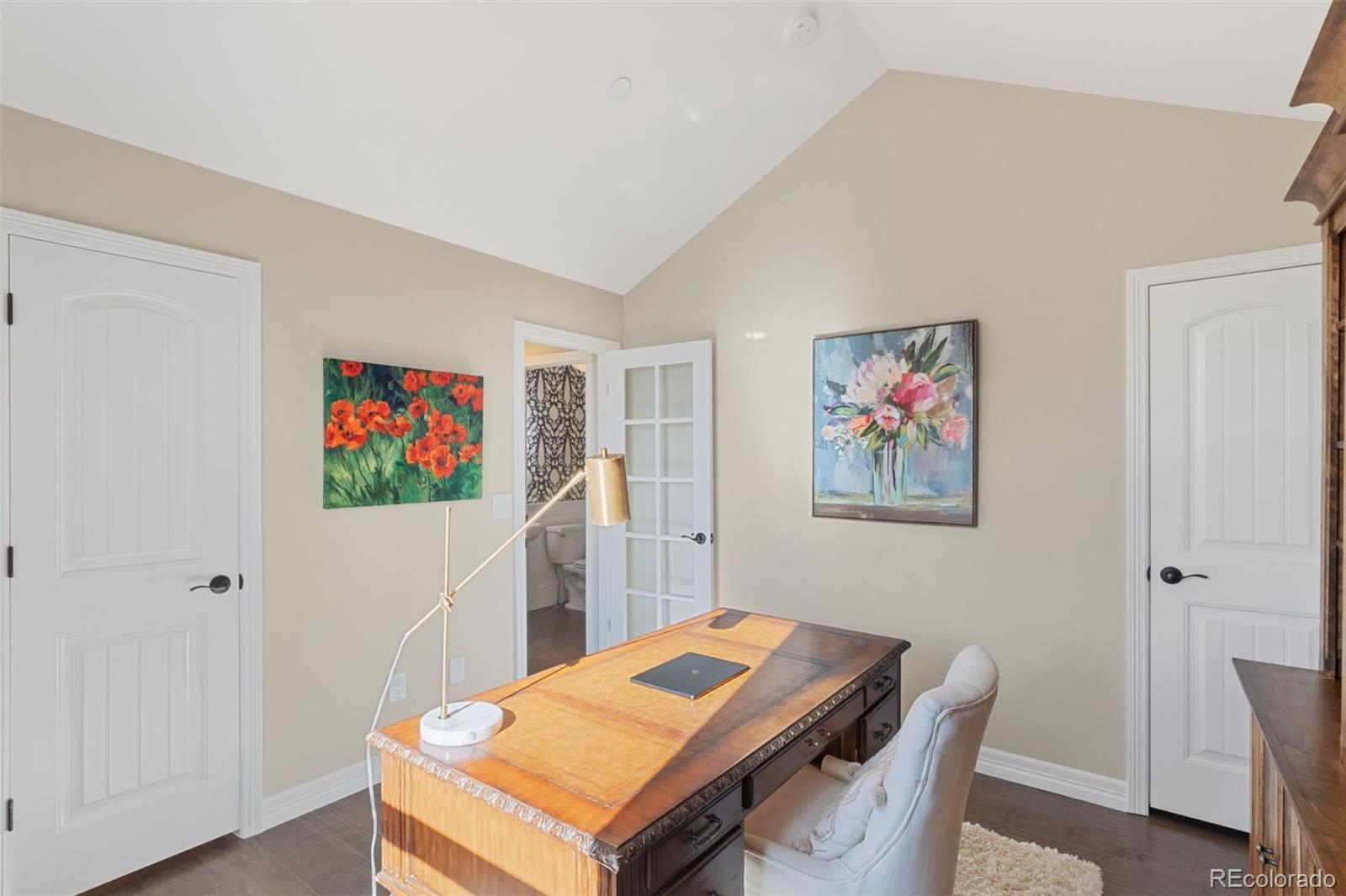 5318 Rocking Tree Grove Colorado Springs, CO 80906 - Photo 13 of 50 a living room with furniture and a table