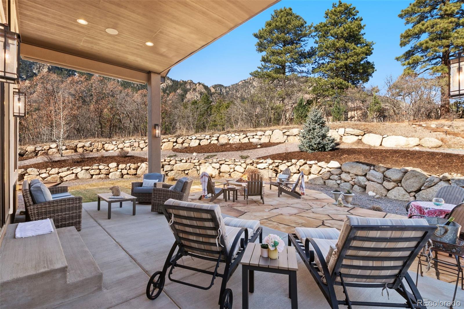 5318 Rocking Tree Grove Colorado Springs, CO 80906 - Photo 38 of 50 a outdoor dining space with furniture and outdoor view