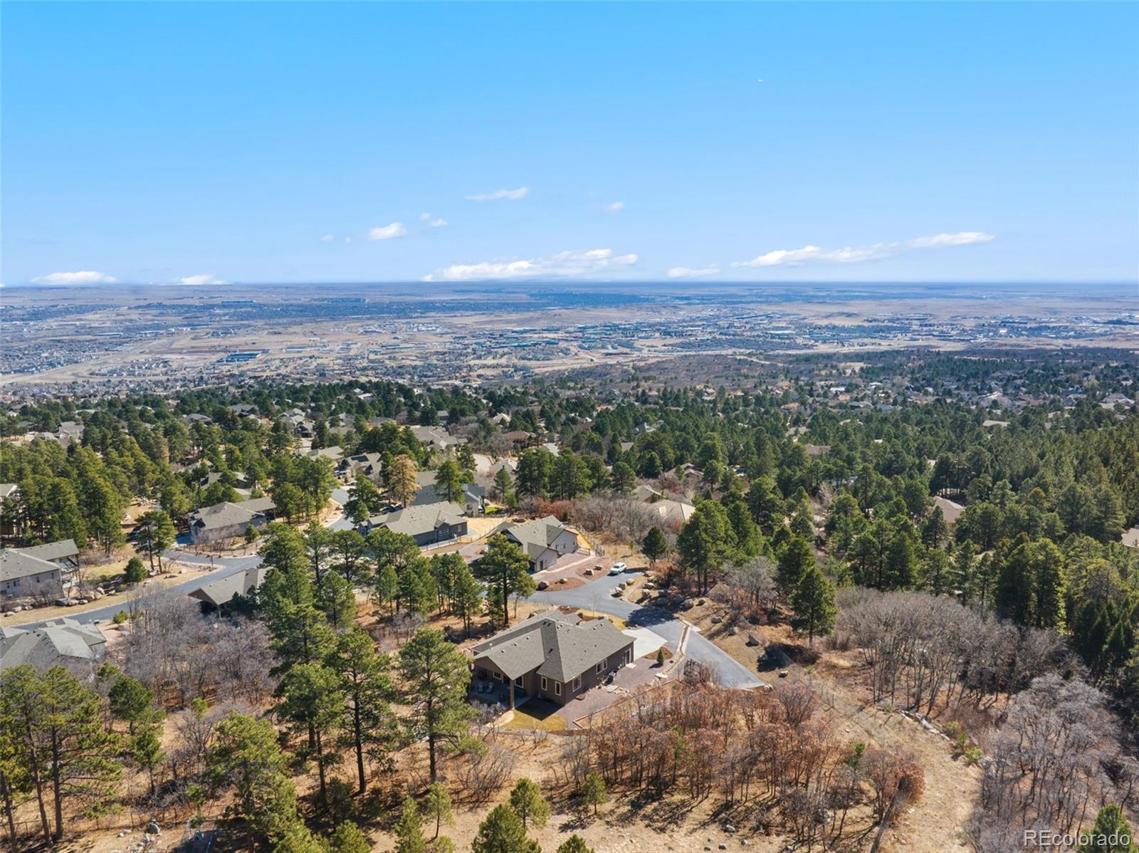 5318 Rocking Tree Grove Colorado Springs, CO 80906 - Photo 49 of 50 a view of a city with lots of trees