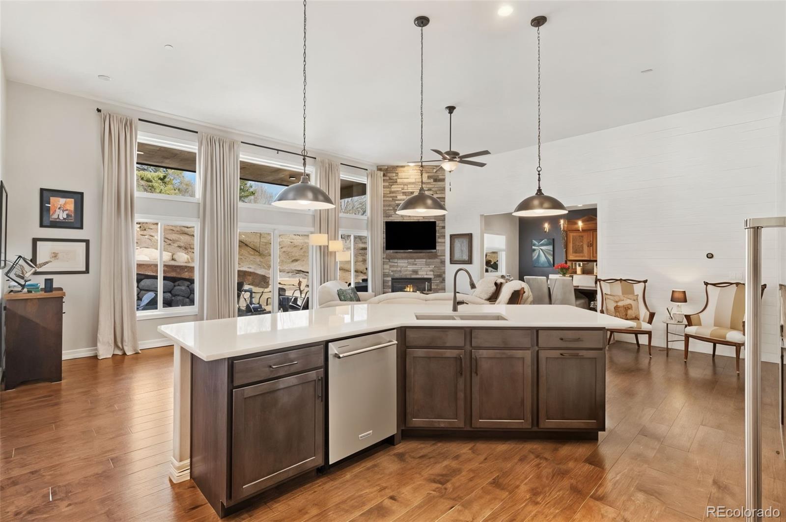 5318 Rocking Tree Grove Colorado Springs, CO 80906 - Photo 8 of 50 a large kitchen with lots of counter space