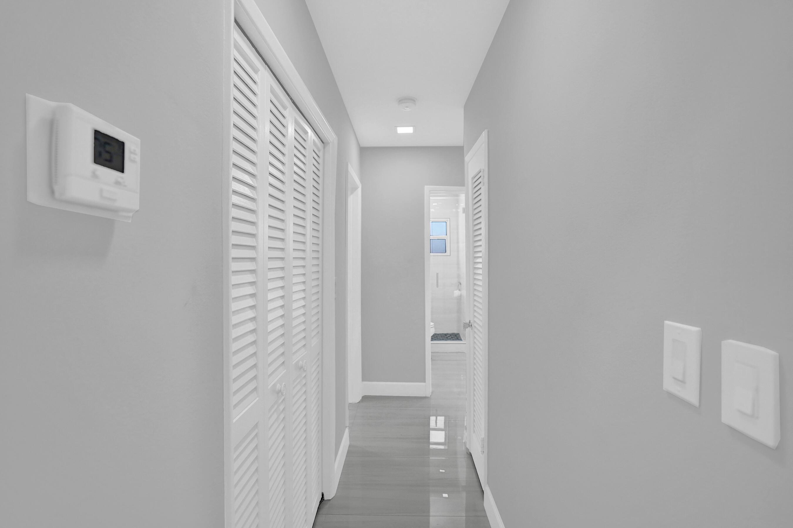 2755 Northeast 28th Avenue, Unit F2 Lighthouse Point, FL 33064 - Photo 17 of 32 a view of a hallway with closet