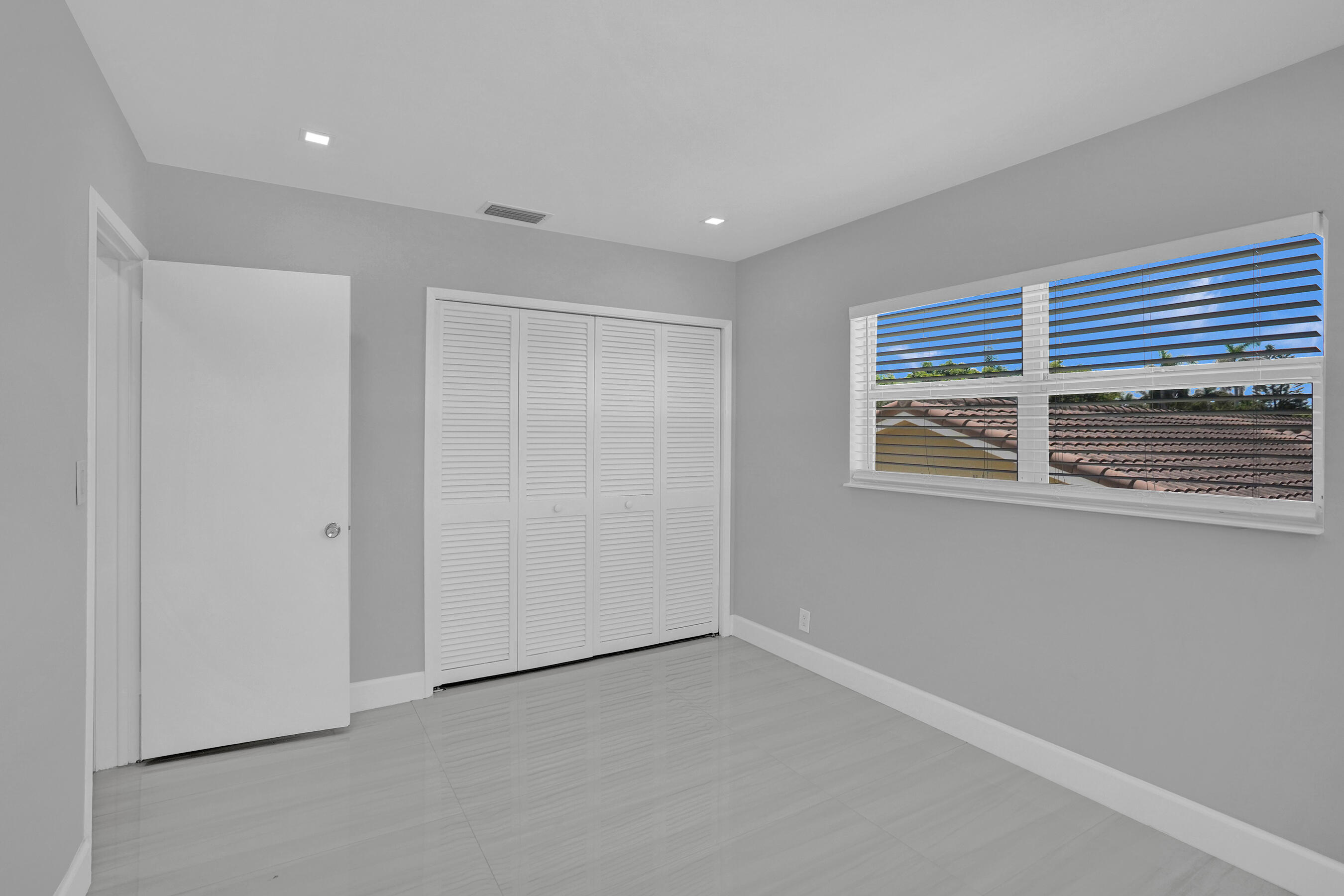 2755 Northeast 28th Avenue, Unit F2 Lighthouse Point, FL 33064 - Photo 21 of 32 a view of empty room