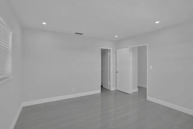 a view of an house with backyard porch and furniture